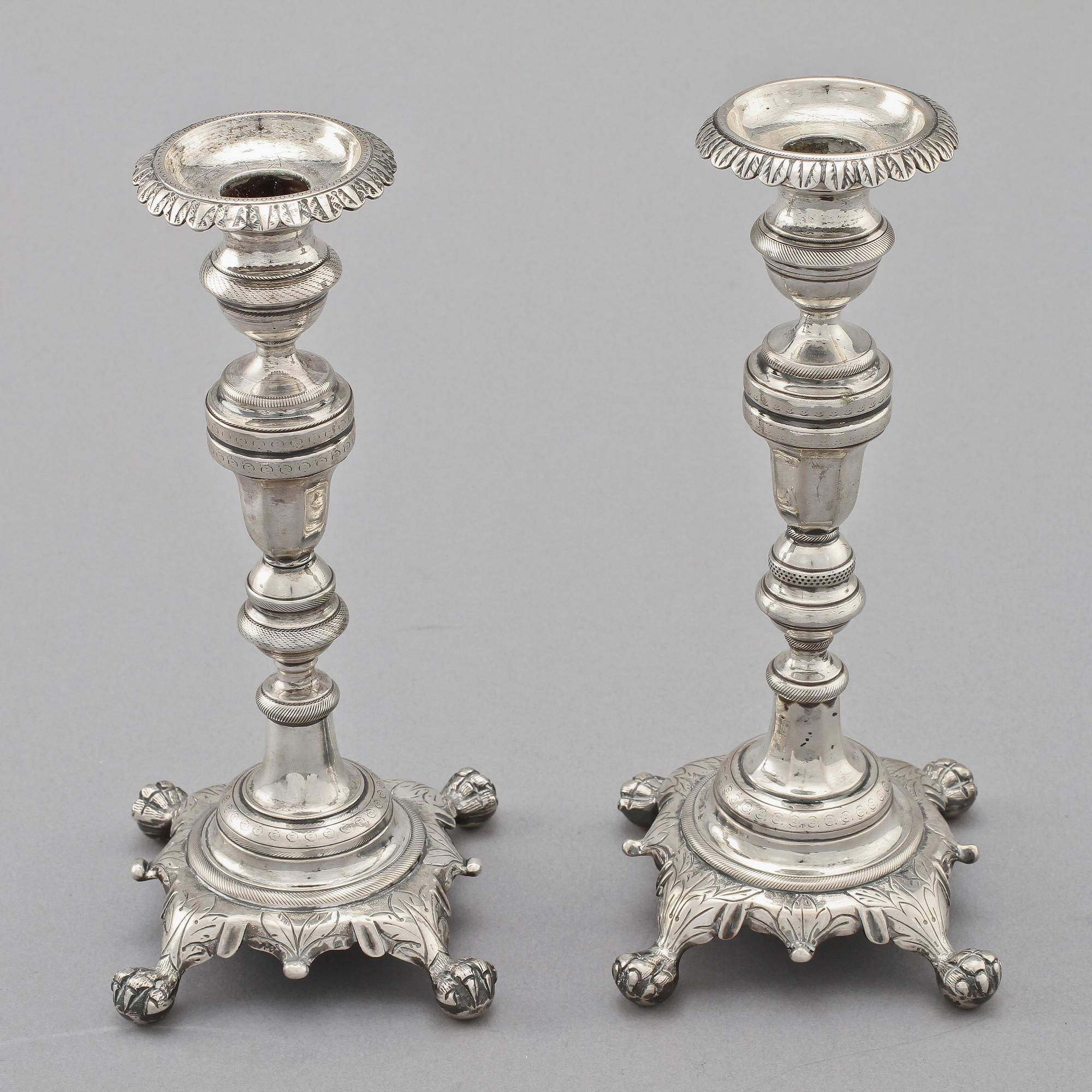 LJUSSTAKAR, ett par, silver, 1800-talets andra hälft, vikt 710 g.