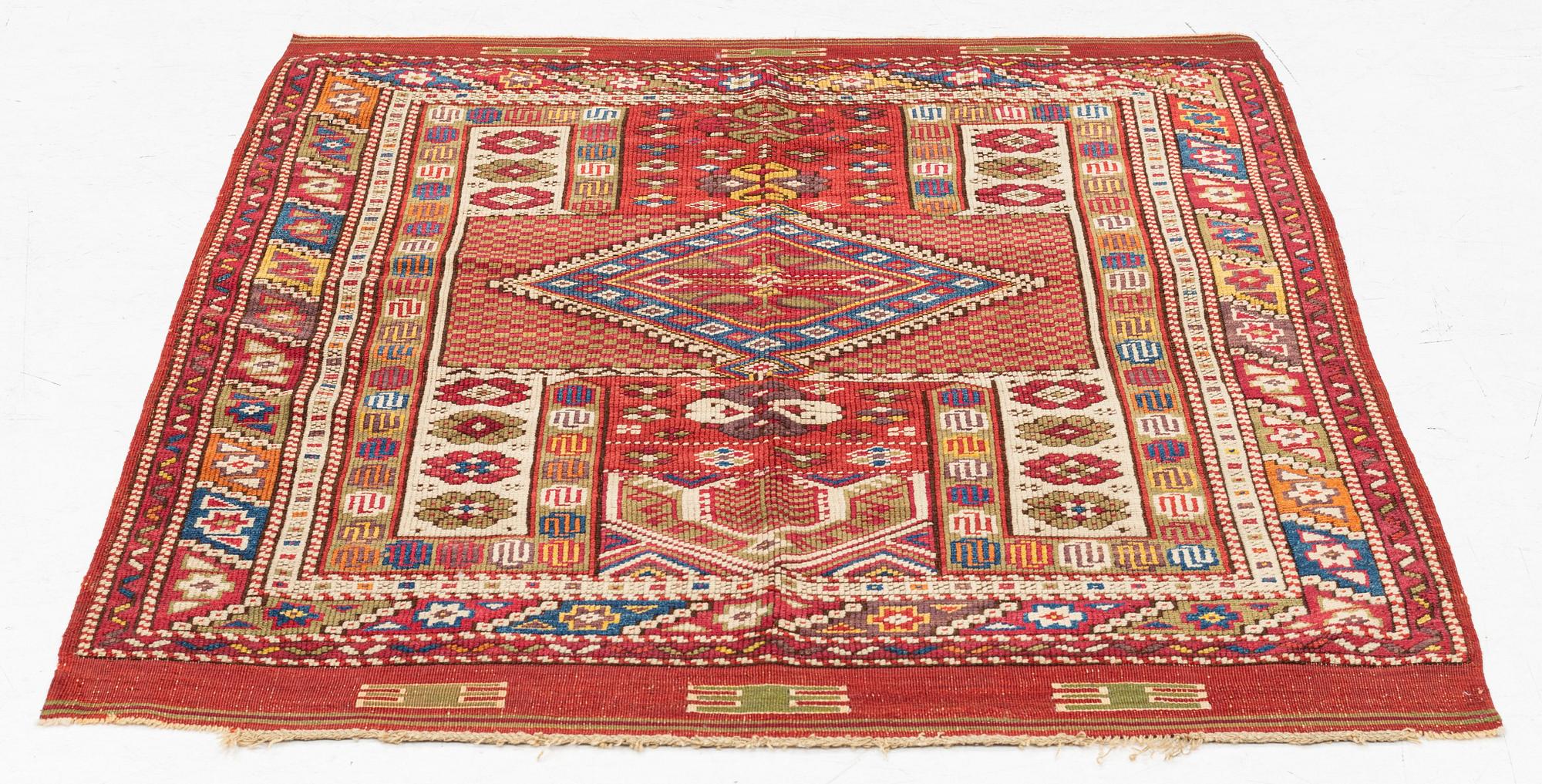 An antique Kozak Bergama, western Anatolia, c. 115 x 96 cm.