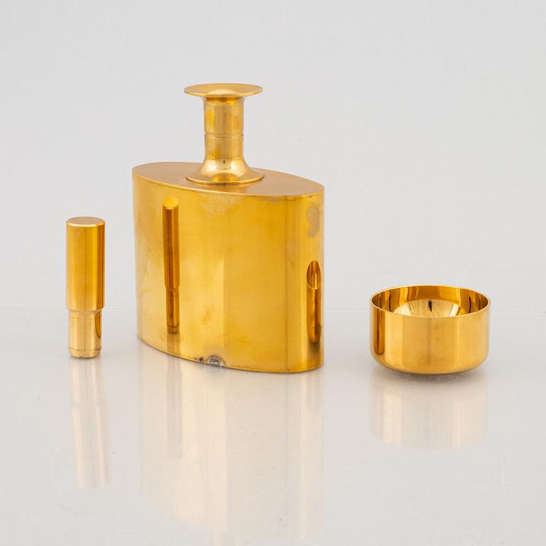 Pierre Forssell, eight gilded cups and a bottle, in a box, Skultuna, Sweden.