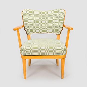 A mid-20th century armchair upholstered with fabric by Johanna Gullichsen.