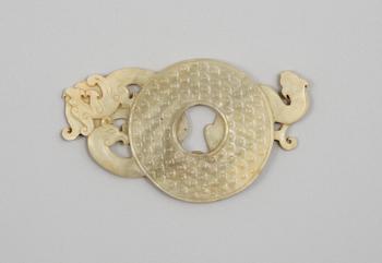 A carved archaistic nephrite placque, presumably Qing dynasty.