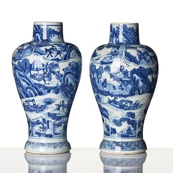 A pair of blue and white 'landscape' vases, Qing dynasty, Kangxi (1662-1722).