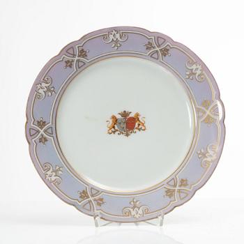 A group of three armorial dinner plates, presumably France, late 19th century.