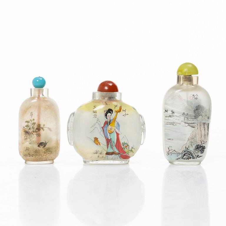 A group of three Chinese glass snuffbottles, 20th century.
