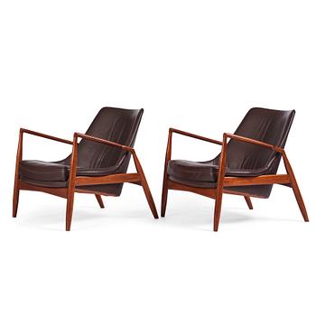 355. Ib Kofod-Larsen, a pair of "Sälen" dark brown leather chairs, Olof Perssons Fåtöljindustri (OPE), Jönköping.