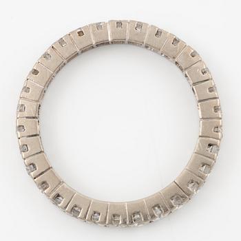 Alliansring, helallians, 18K vitguld med briljantslipade diamanter.