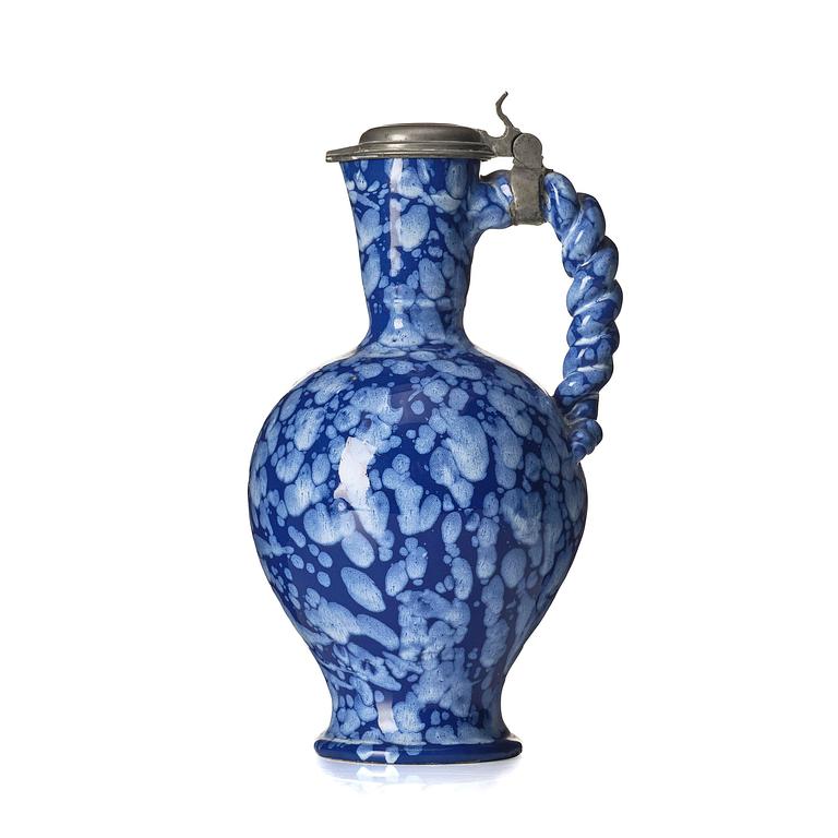 A French Nevers 'Bleu Persan' ewer with pewter cover, c. 1700.