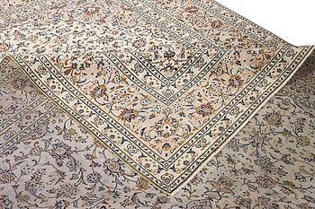 A Kashan carpet, c. 403 x 300 cm.