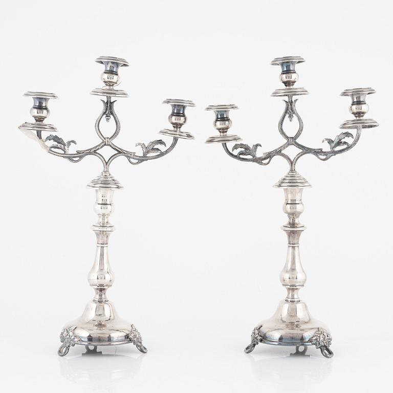 A pair of silver-plate candelabras, early 20th century.