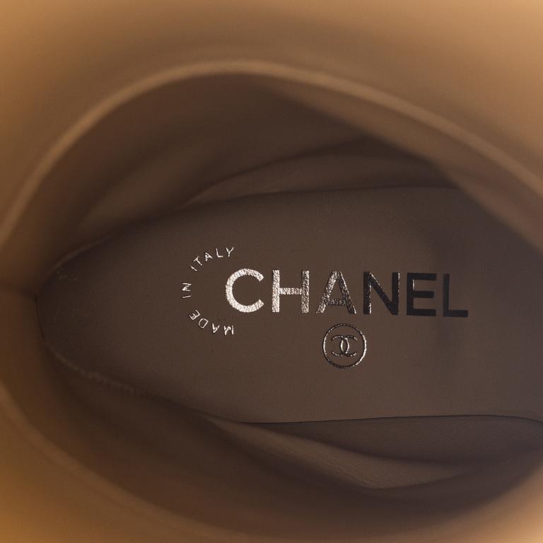 Chanel, a pair of sequin high boots, size 37.