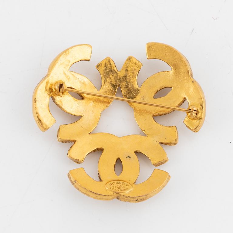 Chanel, Gold Metal Textured Triple CC Logo Brooch, 1994.