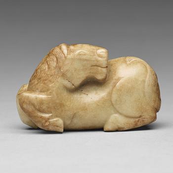 A carved nephrite figure, Ming dynasty (1368-1644).