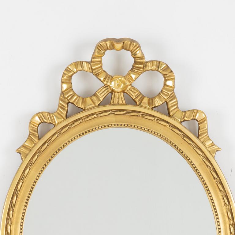 A Gustavian style mirror, mid 20th century.