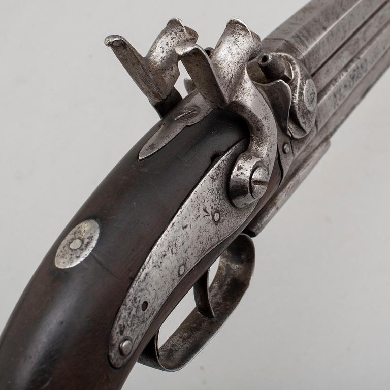 A second part of the 19th century double barreled over-and-under percussion pistol.