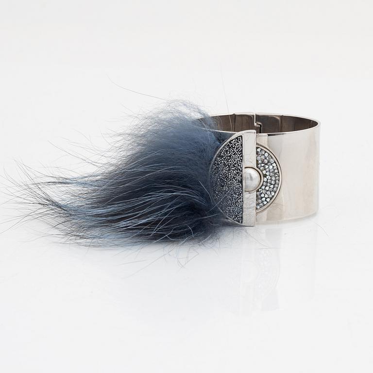 Fendi, a silvertone metal, rhinestone and fur bracelet.