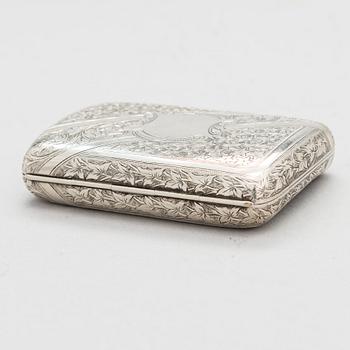 An English sterling silver cigarette case, maker's mark William M. Hayes, of Birmingham, 1896.