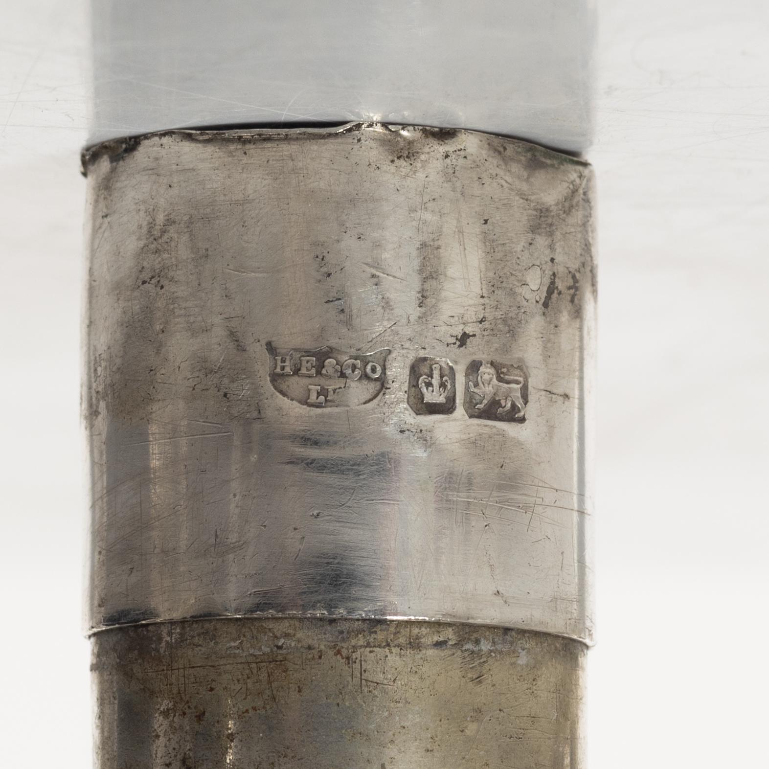 A pair of English silver candelabra, mark of Hawksworth, Eyre & Co Ltd, Sheffield 1892.