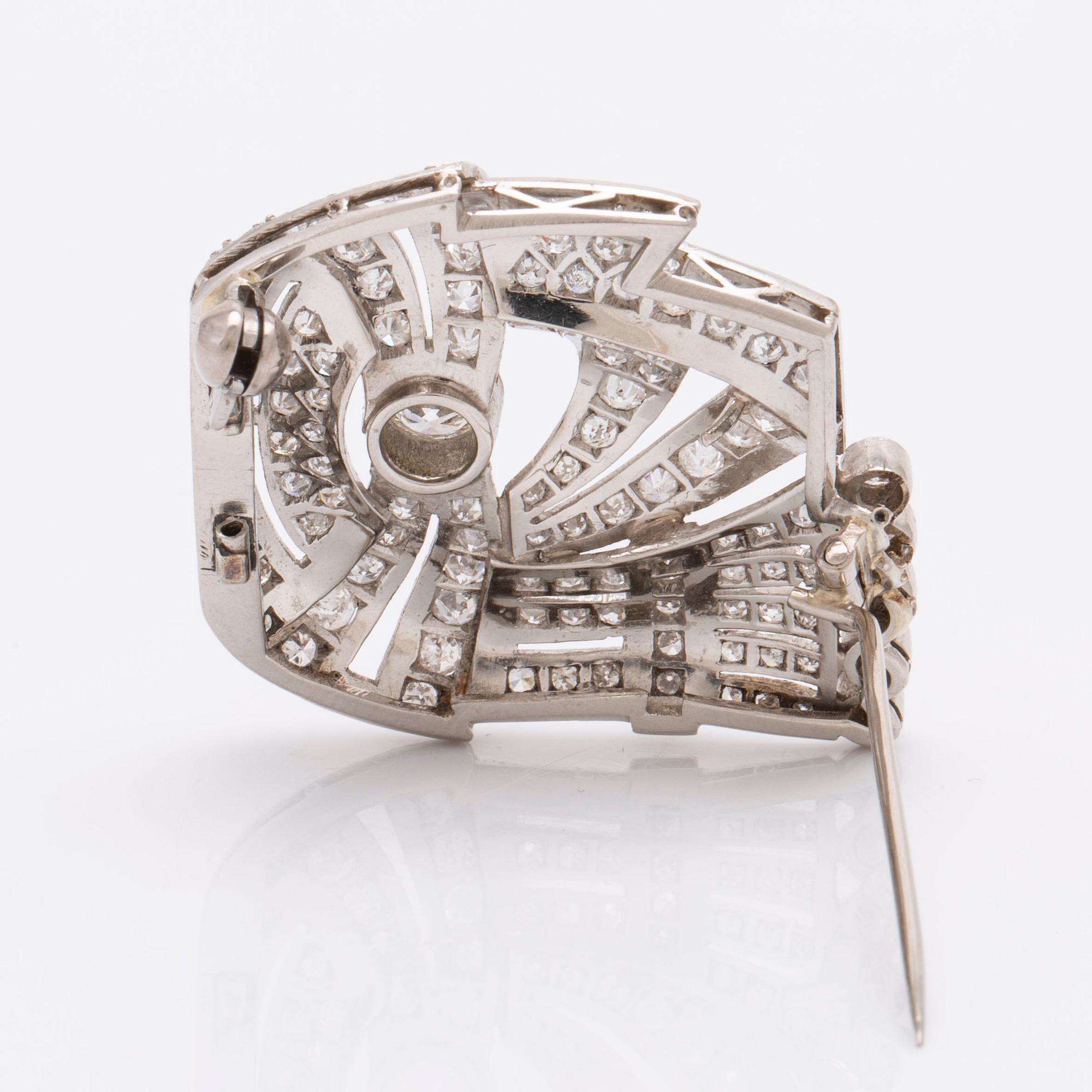 Brosch 18K vitguld/platina briljanter och diamanter8/8 ca 3 ct totalt, ca 3 x 3 cm.