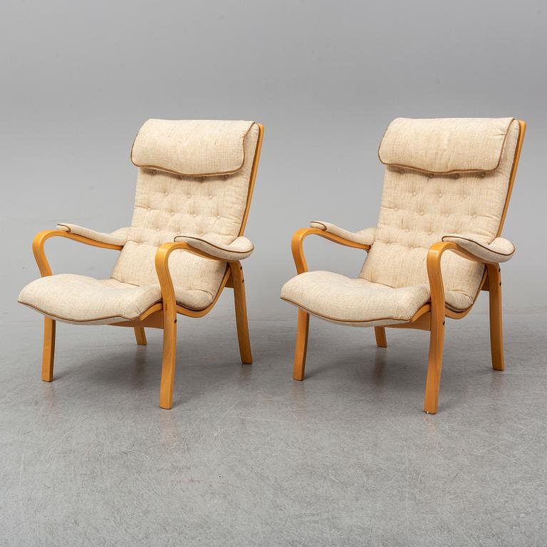 GUSTAV AXEL BERG, a pair of 'Peter' easy chairs, Bröderna Andersson.