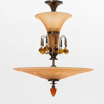 Harald Notini, a model '6658' glass and brass ceiling light, Arvid Böhlmarks Lampfabrik, 1930's.