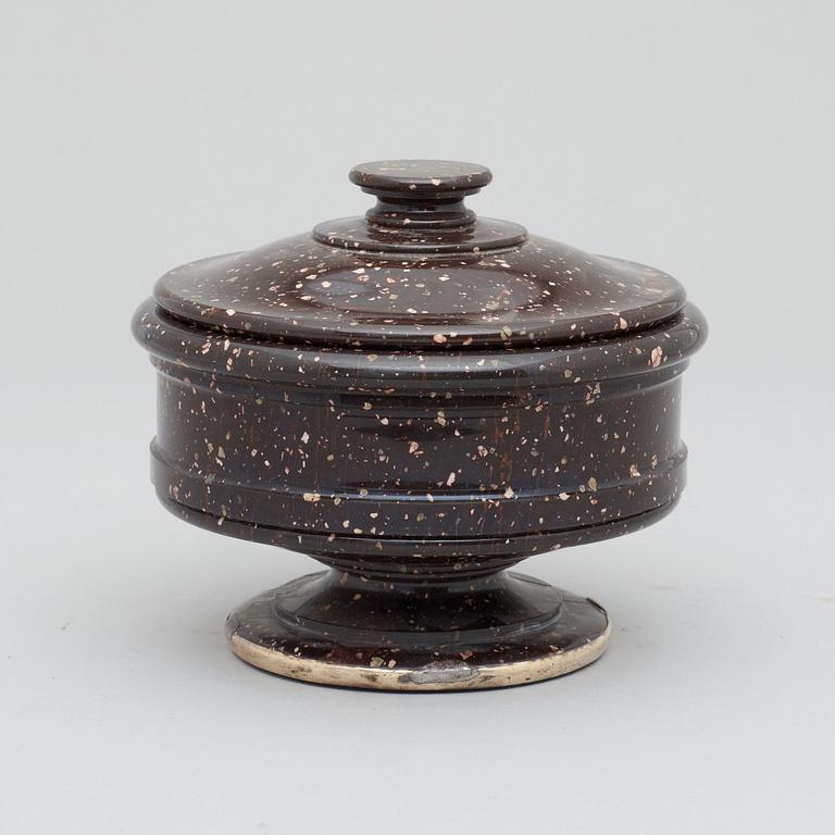 A Swedish Empire 19th century porphyry jar with cover.