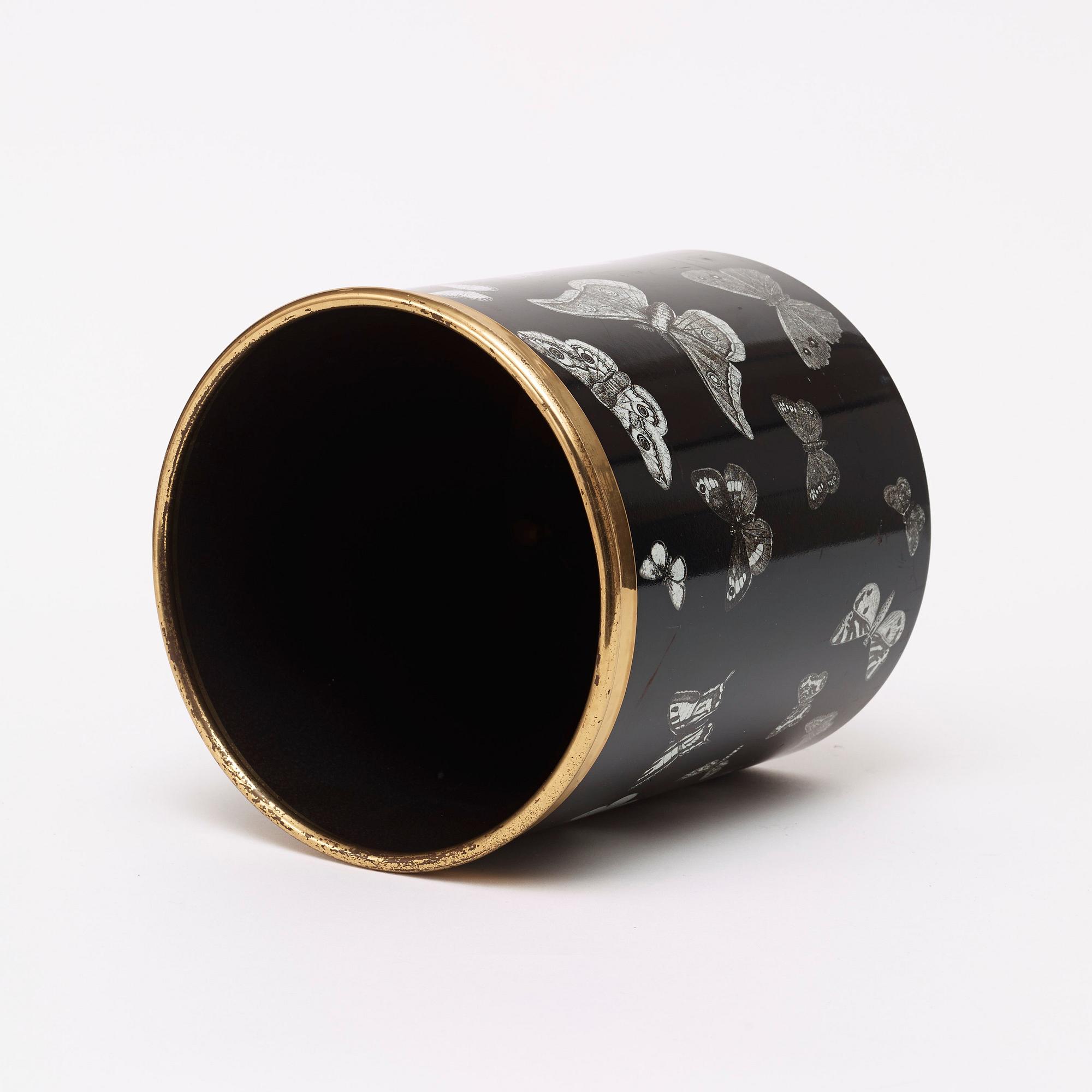 A Piero Fornasetti waste paper bin, Milan, Italy.