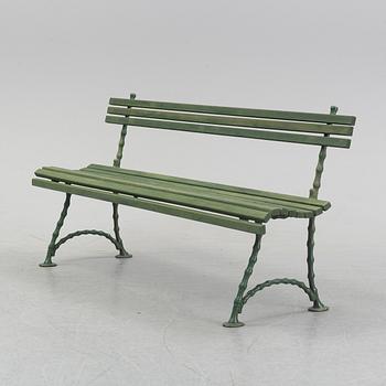 A garden sofa, circa 1900.