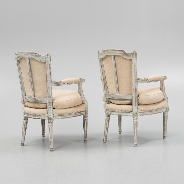 A pair of Louis XVI-style armchairs, late 20th century.