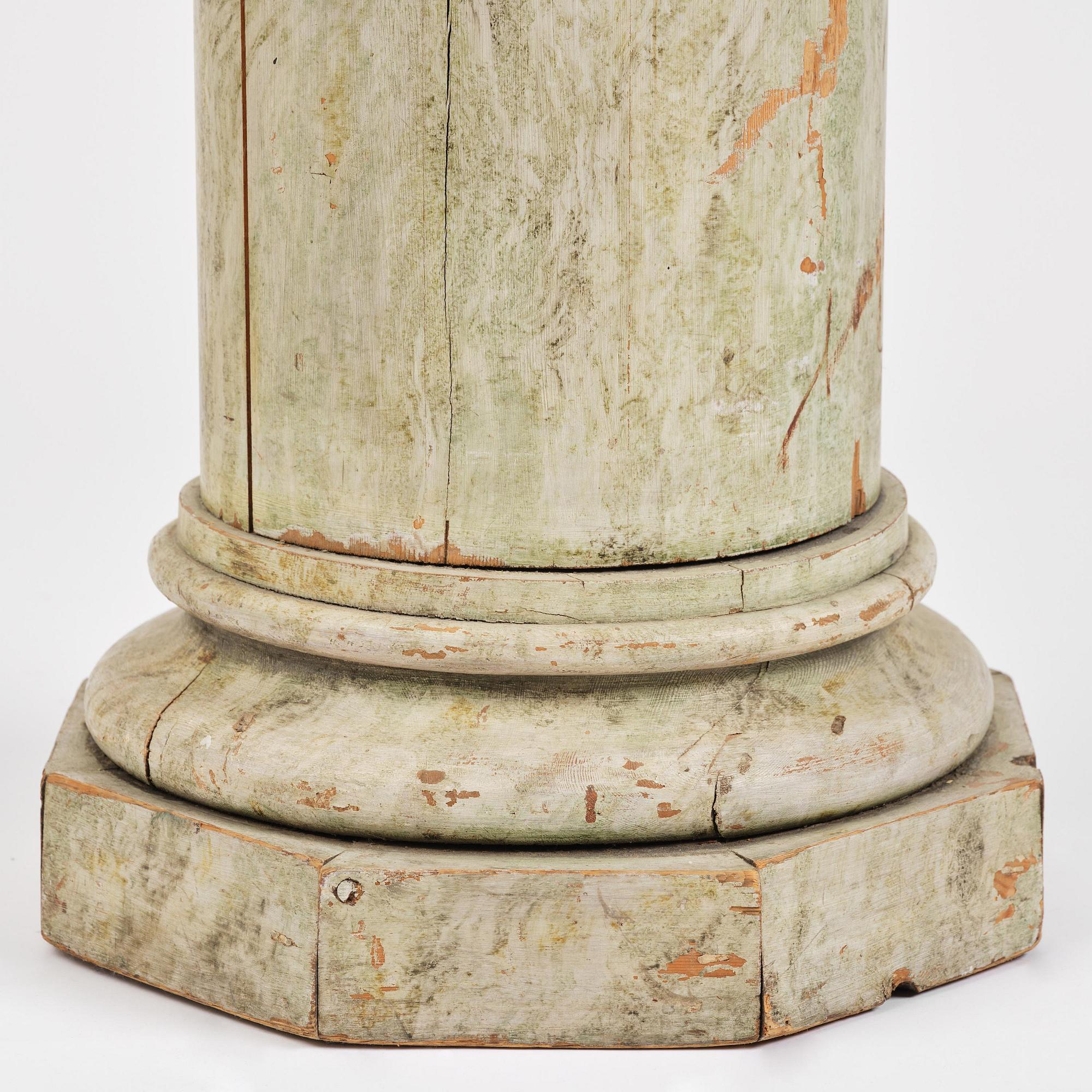 A Swedish Empire marbled column, first part 19th century.