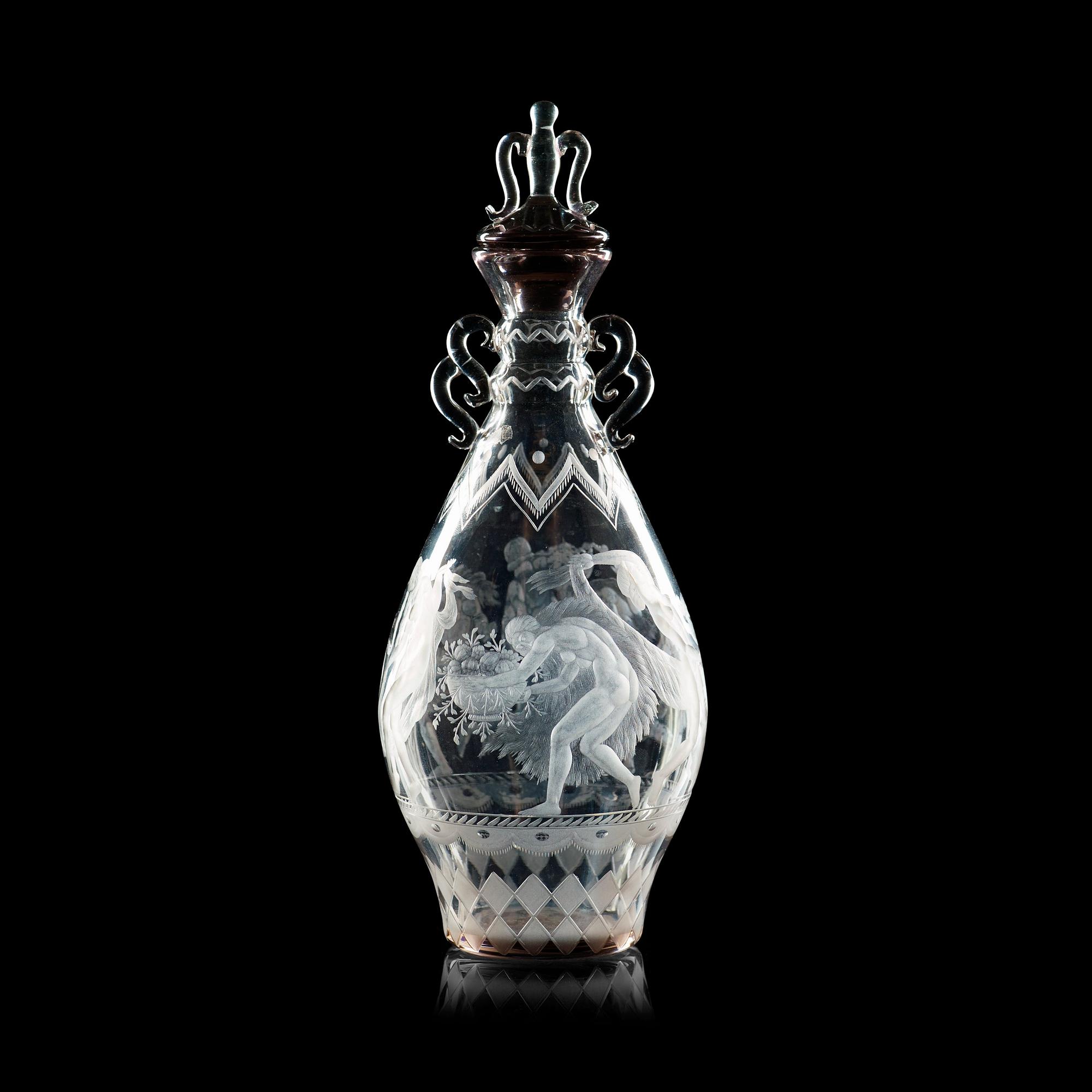 A Simon Gate engraved glass decanter with stopper, Orrefors 1925.