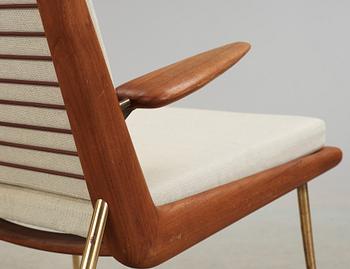 A Peter Hvidt & Orla Mølgaard-Nielsen 'Boomerang, FD-134' teak and brass easy chair, France & Daverkosen, 1950's.