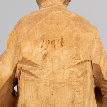 Axel Petersson Döderhultarn, sculpture. Signed. Carved and partly painted wood. Height 25.5 cm.