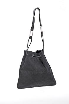 A black monogram canvas shoulder bag by Gucci.