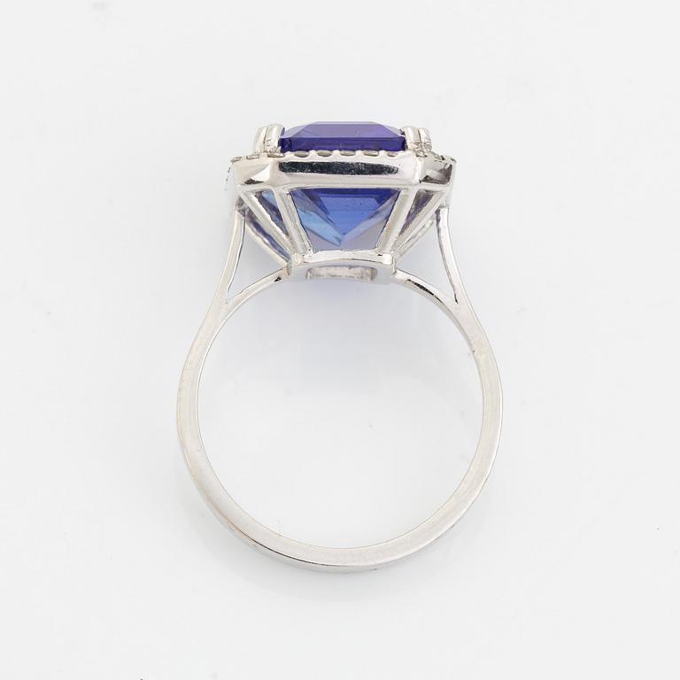 Emerald cut tanzanite and brilliant cut diamond cocktail ring.