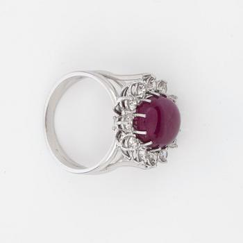 A 10.00 ct untreated cabochon-cut ruby and brilliant-cut diamond ring. Total carat weight of diamonds 0.70 ct. GRS cert.