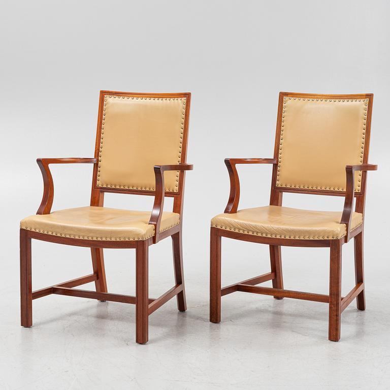 A par of stained beech wood armchairs, end of the 20th Century.