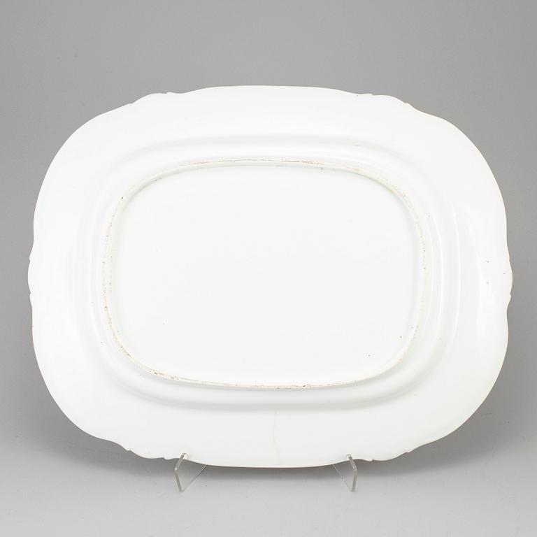 A large enamelled porcelain serving dish, late Empire, second half of the 19th century.