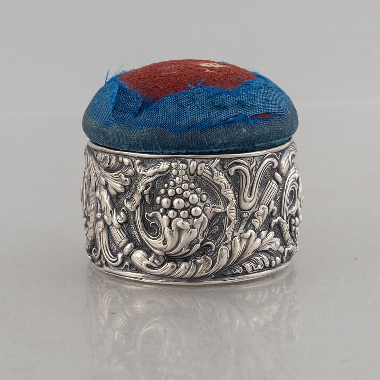 Tiffany & Co, a silver plated box with pin cushion lid.