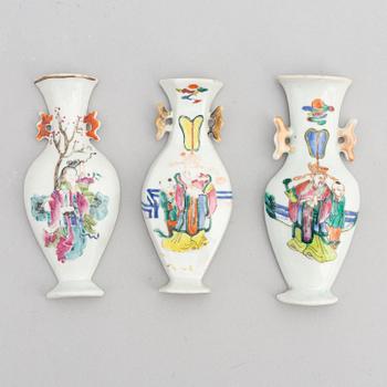 A set of three Chinese porcelain wall vases, late Qing dynasty around the year 1900, and 20th century.