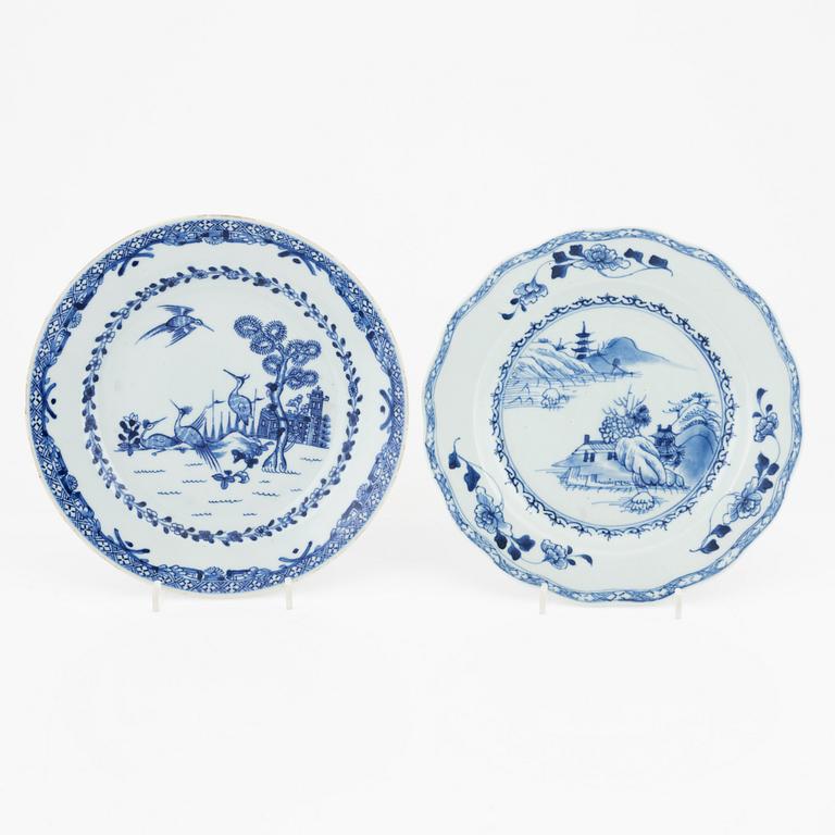 A blue and white dish and seven odd dinner plates, Qing dynasty, Qianlong (1736-95).