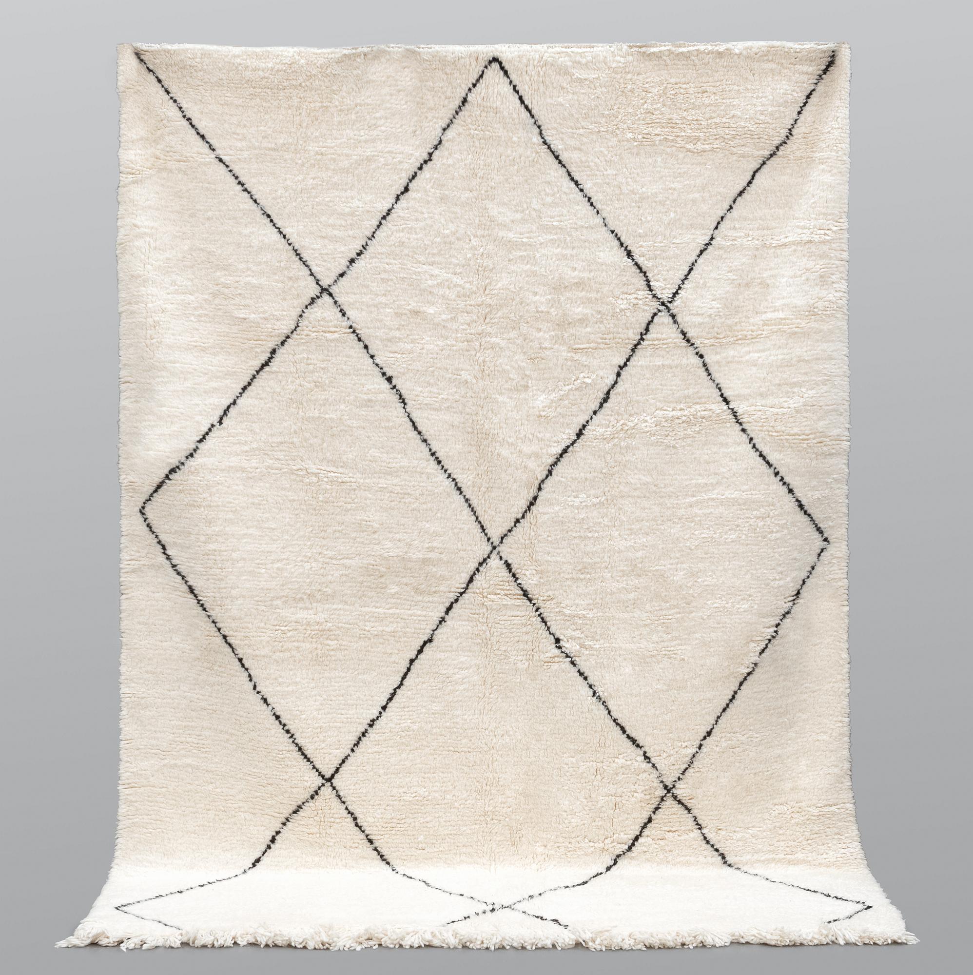 A Moroccan carpet, 297 x 206 cm.