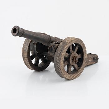 A cast iron canon, early 20th Century.