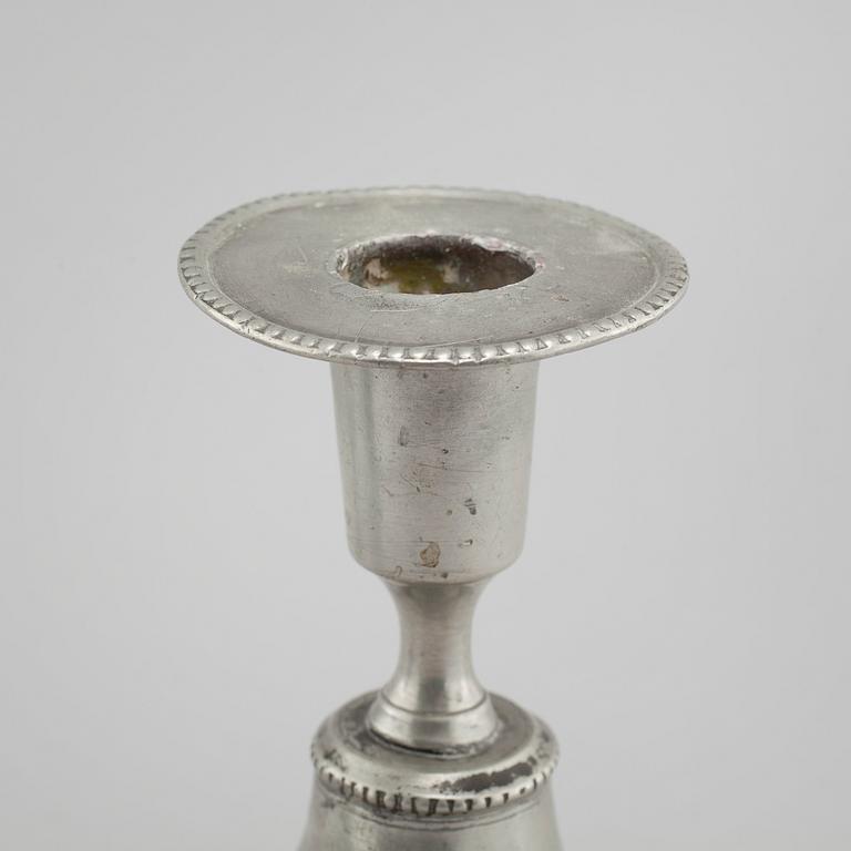 A pair of pewter candlesticks, probably by Gustaf Frederic Wigholm in Eskilstuna, first half of the 19th century.