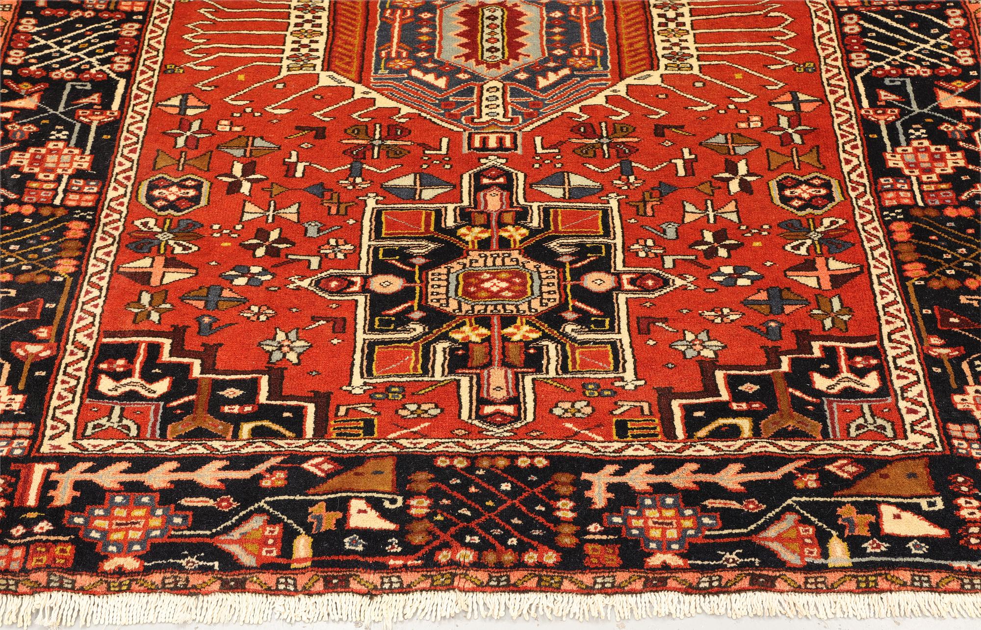 A Heris rug, approx. 191 x 157 cm.