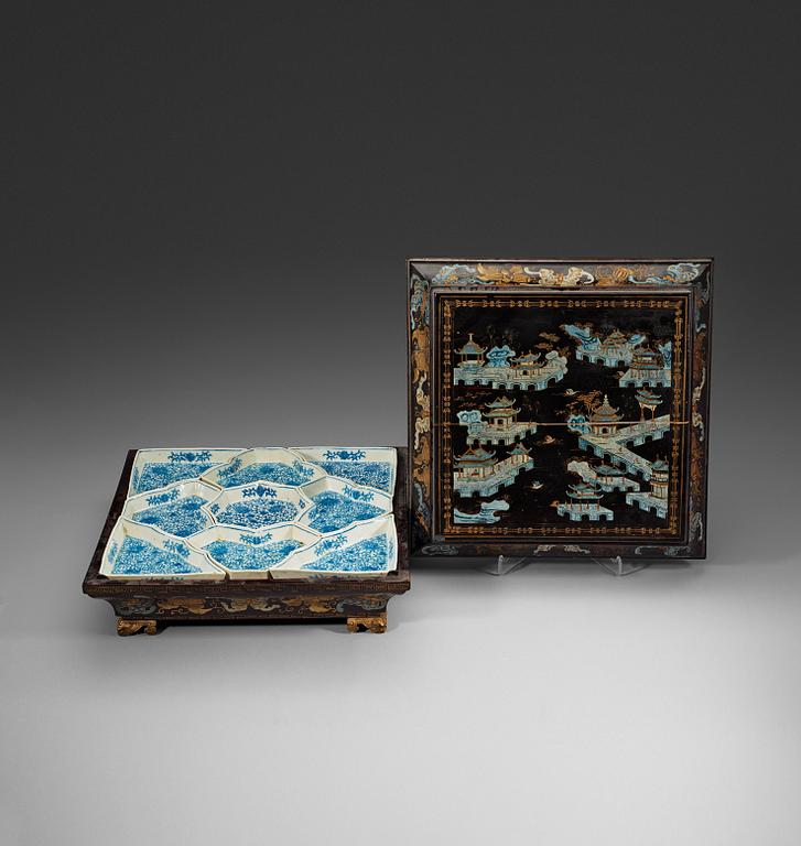A black lacquer box and cover with a nine-piece cabaret, Qing dynasty, 19th Century.