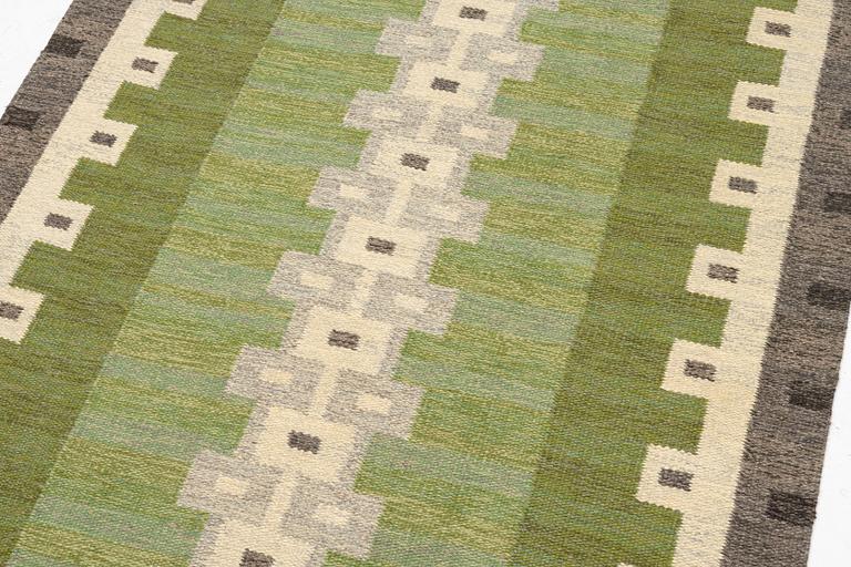 Aina Kånge, a flat weave runner, c 340 x 140 cm, signed AK.