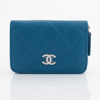 Chanel, a blue caviar leather wallet.