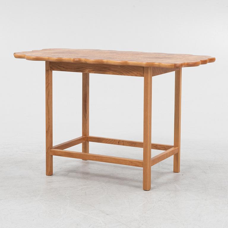 Josef Frank, an elm root top model 1058 coffee table from Firma Svenskt Tenn.