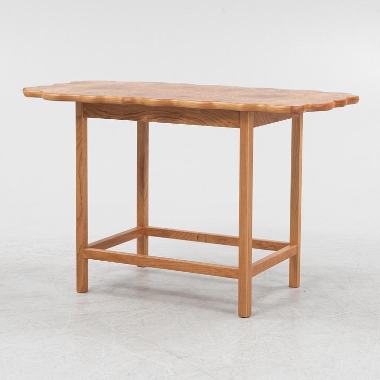 Josef Frank, an elm root top model 1058 coffee table from Firma Svenskt Tenn.