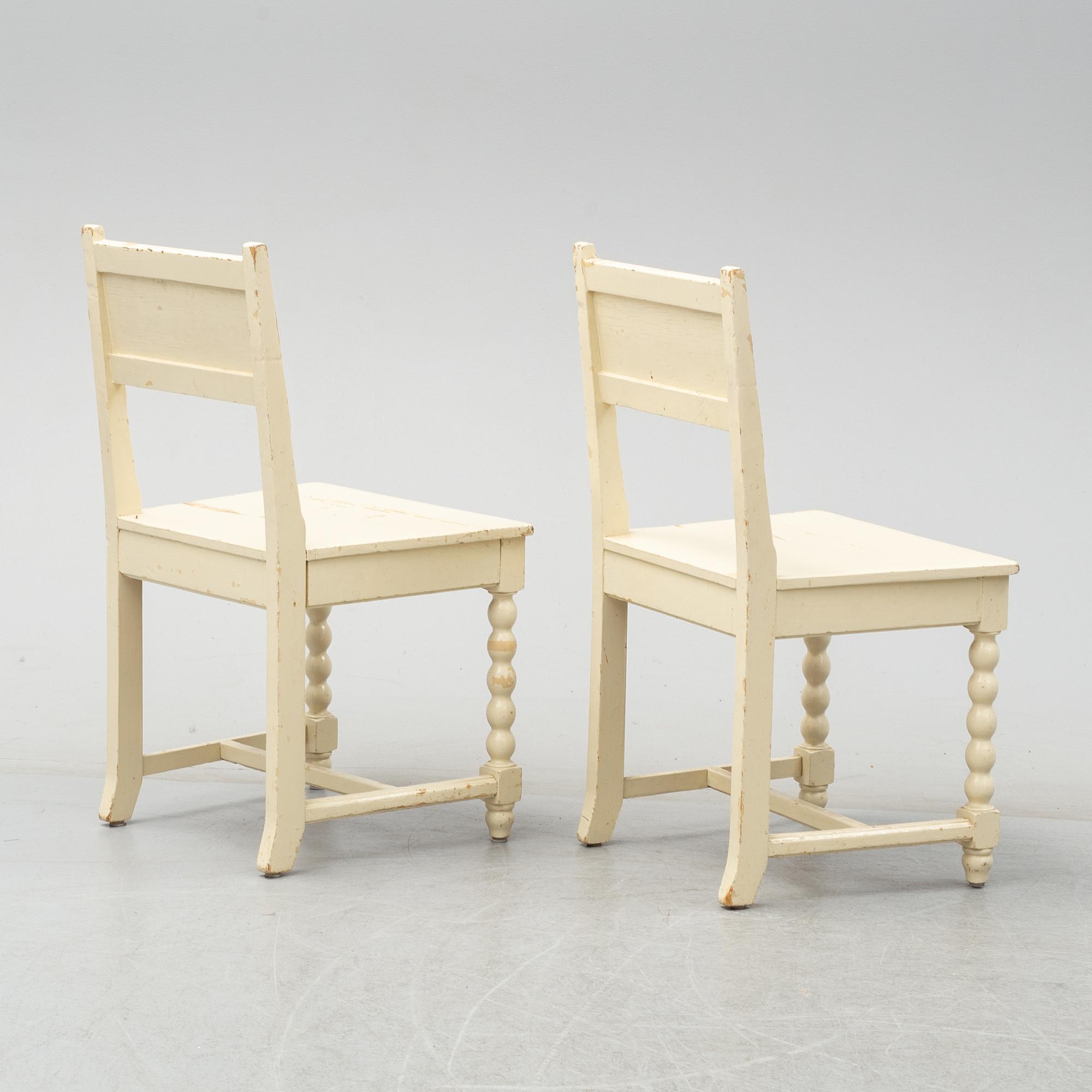 A set of table and two chairs, baroque-style, 20th century.